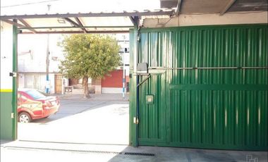 Estacionamiento sobre dos lotes propios