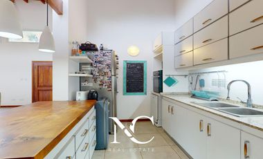 Casa en venta en Costa Esmeralda con fondo libre arbolado