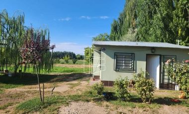 Venta - Chacra sobre calle Primeros Pobladores con casa - R026