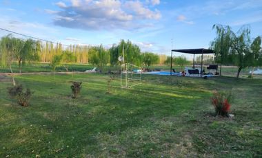 Venta - Chacra sobre calle Primeros Pobladores con casa - R026