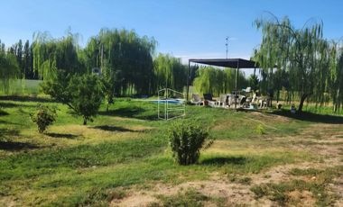 Venta - Chacra sobre calle Primeros Pobladores con casa - R026