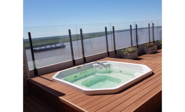 AVDA DEL HUERTO  1115.  Piso exclusivo vista al rio. Amenities. Cochera.