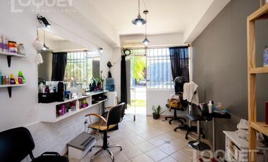 Casa en planta alta con locales comerciales