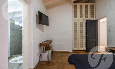 Hotel con vivienda en venta sobre lote propio en esquina, San Pedro – Inversión turística