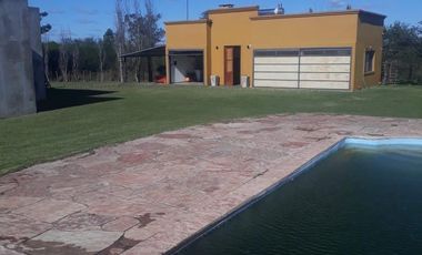 Casa de campo a terminar con quincho/depto con amplia pileta