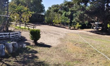 VENDO HERMOSA PARCELA  UBICADA  CAMINO  A RAPEL