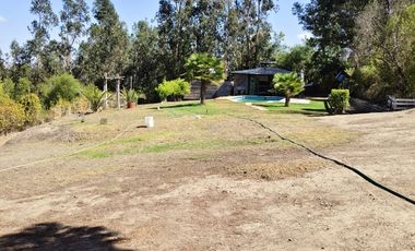 VENDO HERMOSA PARCELA  UBICADA  CAMINO  A RAPEL