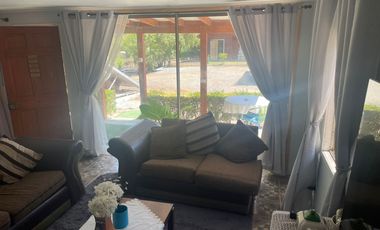 VENDO HERMOSA PARCELA  UBICADA  CAMINO  A RAPEL