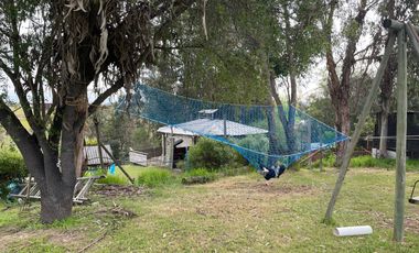 VENDO HERMOSA PARCELA  UBICADA  CAMINO  A RAPEL