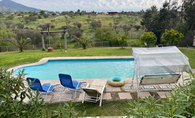 VENDO HERMOSA PARCELA  UBICADA  CAMINO  A RAPEL