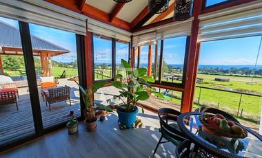 CASA EN RUTA ENSENADA, VISTA LAGO  Y VOLCAN EN 180 GRADOS