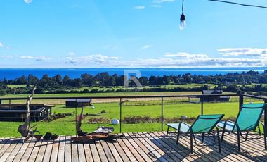 CASA EN RUTA ENSENADA, VISTA LAGO  Y VOLCAN EN 180 GRADOS
