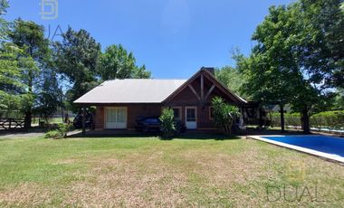 VENTA CASA 3 DORMITORIOS Y PILETA EN COUNTRY LOGARITMO (IBARLUCEA)