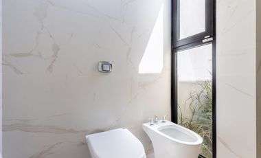 CASA EN VENTA GONNET 3 DORMITORIOS ENTRE CAMINOS