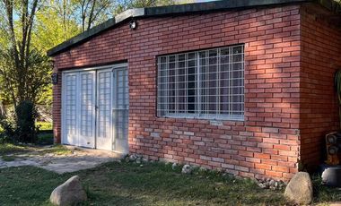 Casa en  Alquiler - Frente al río - 2 Hab. - Patio