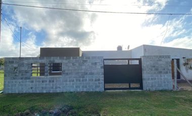 Casa a estrenar 2 dormitorios en Barrio La Raquela. Apto credito!
