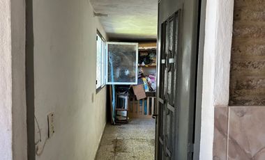 Venta casa con cochera y quincho en G. Baigorria.
