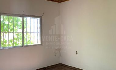 Casa más departamentos céntricos