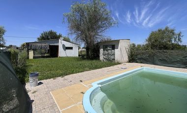 VENTA CASA EN ANDINO 1 DORMI-COCHERA-PILETA