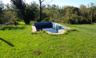 A orillas del Carcarañá. Hermosa Casa-Quinta con Piscina y Amplio Terreno.