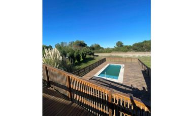 Casa a estrenar en Costa Esmeralda. Piscina. 4 dormitorios.Deportiva