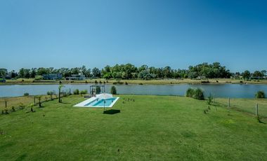 CASA EN VENTA EN AREA 60 CON VISTA A LA LAGUNA