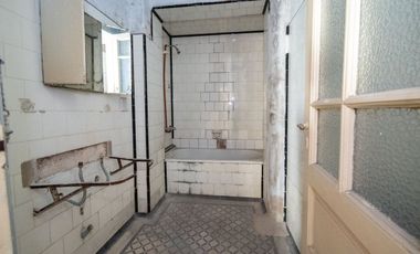 Planta baja  de 4 dormitorios en el centro