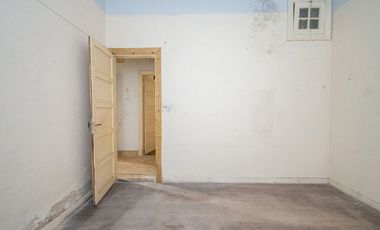 Planta baja  de 4 dormitorios en el centro