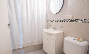 Monoambiente tipo estudio con balcón aterrazado y pileta.