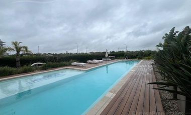 Departamento en venta o alquiler Puerto Escondido, edificio Vilago PB con jardín