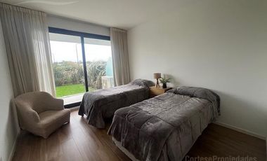 Departamento en venta o alquiler Puerto Escondido, edificio Vilago PB con jardín