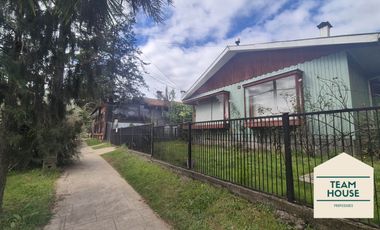 Isla Teja, Casa los Alerces / Destino Comercial