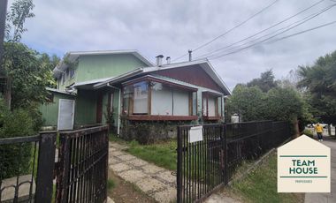 Isla Teja, Casa los Alerces / Destino Comercial