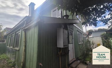 Isla Teja, Casa los Alerces / Destino Comercial