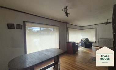 Isla Teja, Casa los Alerces / Destino Comercial