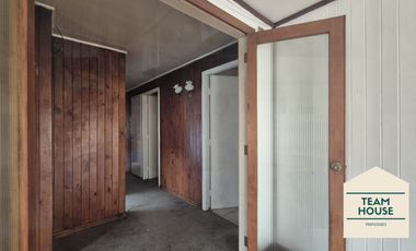 Isla Teja, Casa los Alerces / Destino Comercial