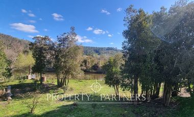 Parcela con Casa y Borde Río en Sector Arique