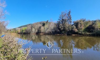 Parcela con Casa y Borde Río en Sector Arique