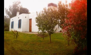 Casa en Acantilados Sobre Dos Terrenos