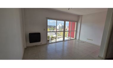 Moderno  departamento de 3 amb al frente con cochera
