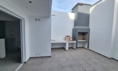 DEPARTAMENTO DE 2 DORMITORIOS CON COCHERA Y PATIO