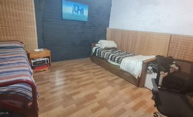 Lote con casa a refaccionar