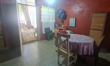 Lote con casa a refaccionar
