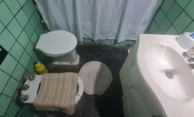 Lote con casa a refaccionar