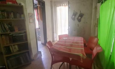 Lote con casa a refaccionar