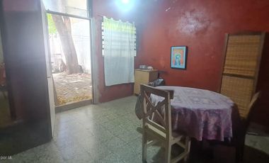 Lote con casa a refaccionar