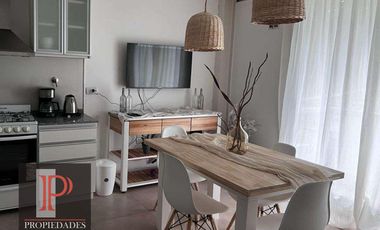 Departamento amoblado de 2 ambientes con cochera y terraza propia