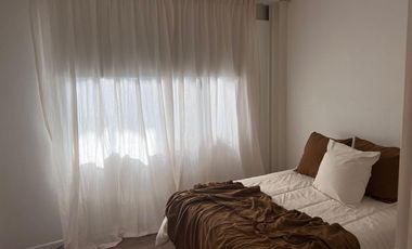 Departamento amoblado de 2 ambientes con cochera y terraza propia
