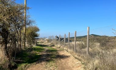 SE VENDE PARCELA CERCADA A ORILLA DE CAMINO 5000 M2