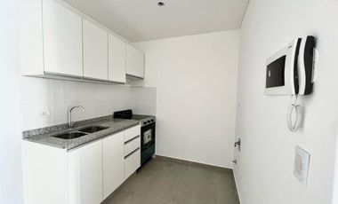 VENTA: Departamento de dos dormitorios, a estrenar, con balcón y cochera. Centro, Rosario
